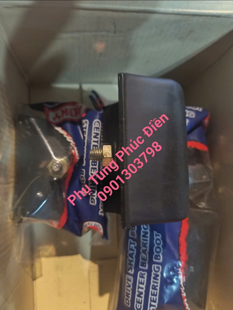 cao su gối nhíp sau isuzu 5 tấn NQR NPR NLR