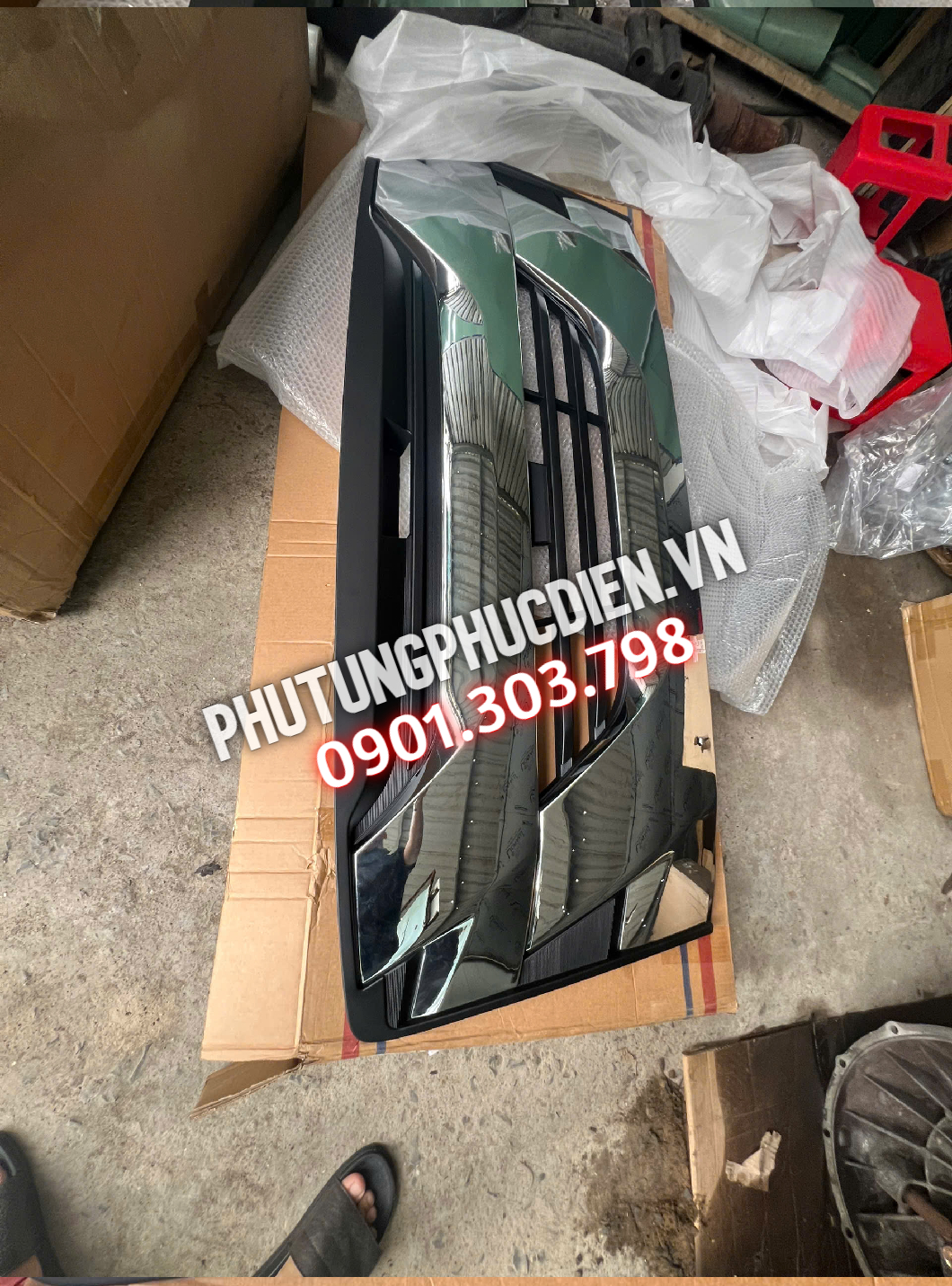 phụ tùng mặt ga lăng isuzu giga
